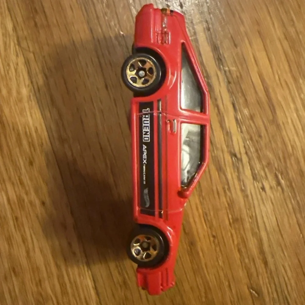 Speedy Red Toy Car with Gold Accents